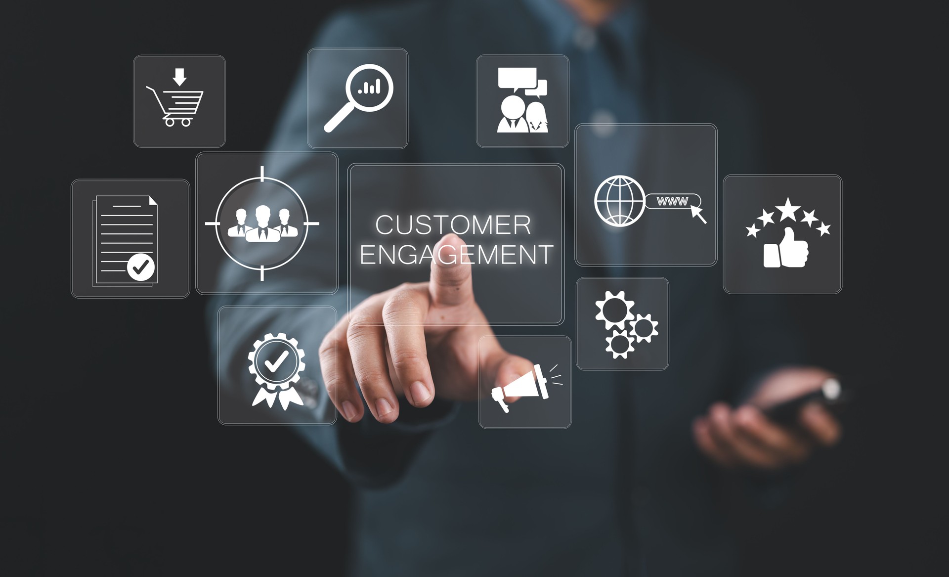 Customer engagement and digital marketing concept. Businessman interacting with virtual icons representing customer engagement, digital marketing, online shopping, and client services using a laptop.